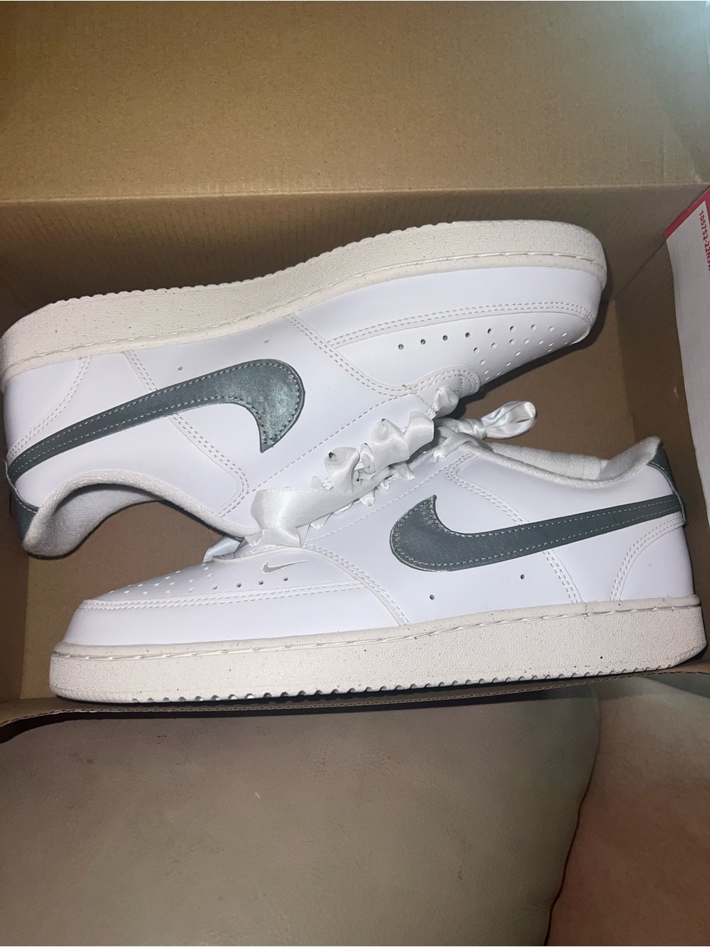 Nike Women’s White Sneakers with Green Swoosh